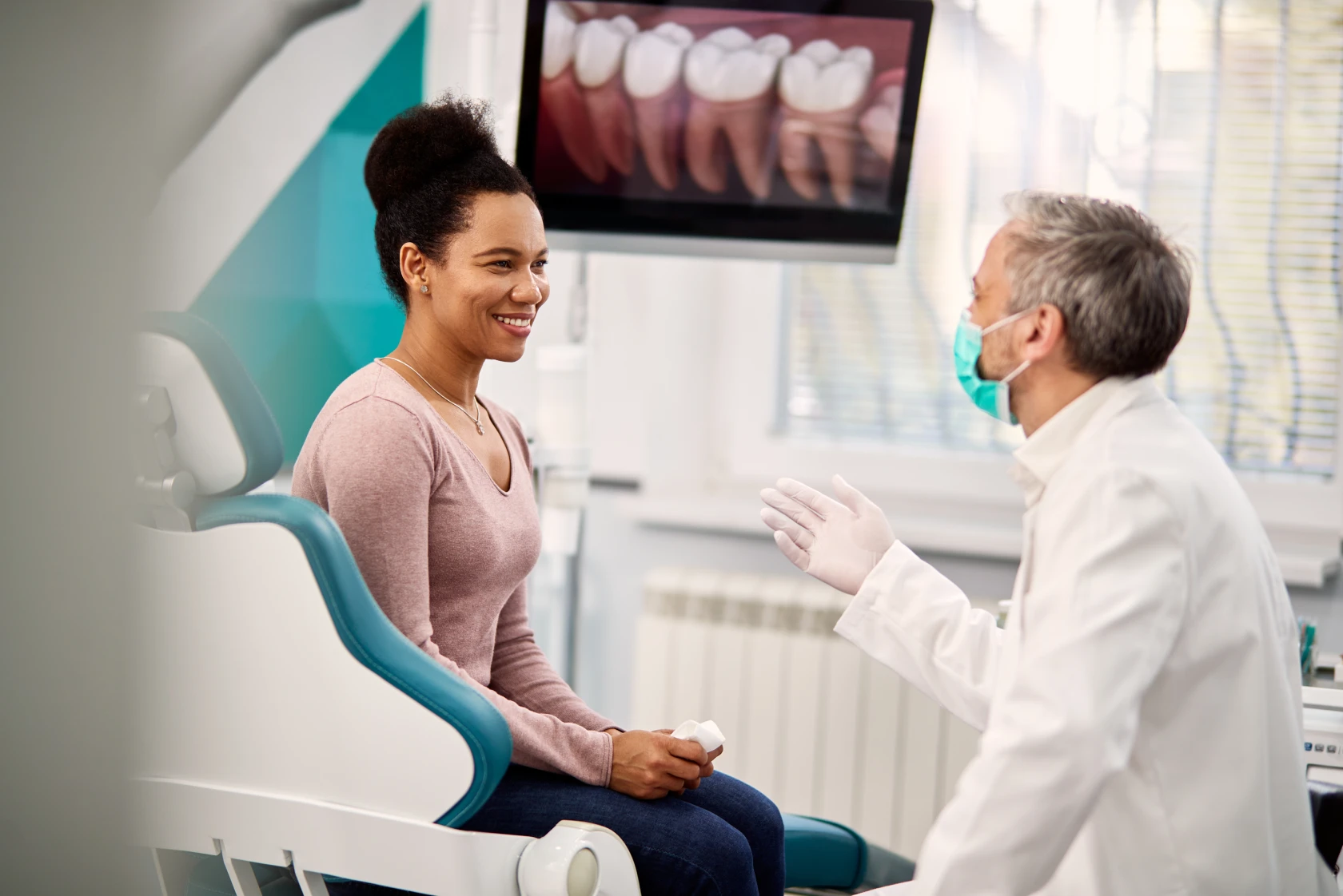 women getting advice from dentist